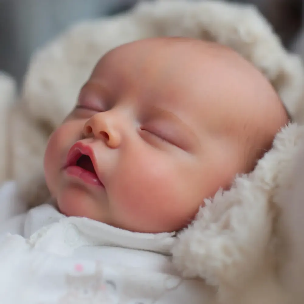 17" Soft Vinyl Closed Eye Reborn Girl with Brown Hair Supported by Heartbeat, photograph 2