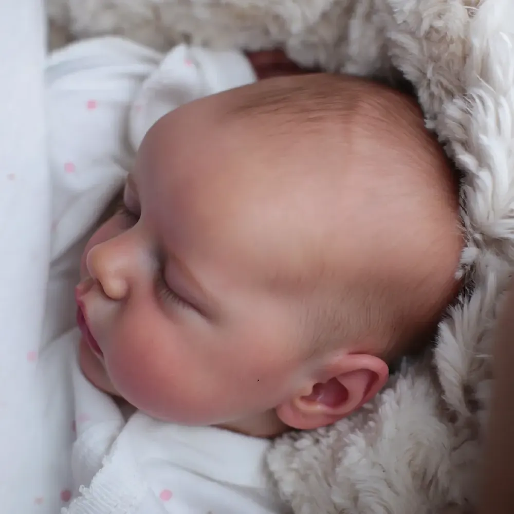 17" Soft Vinyl Closed Eye Reborn Girl with Brown Hair Supported by Heartbeat, photograph 4
