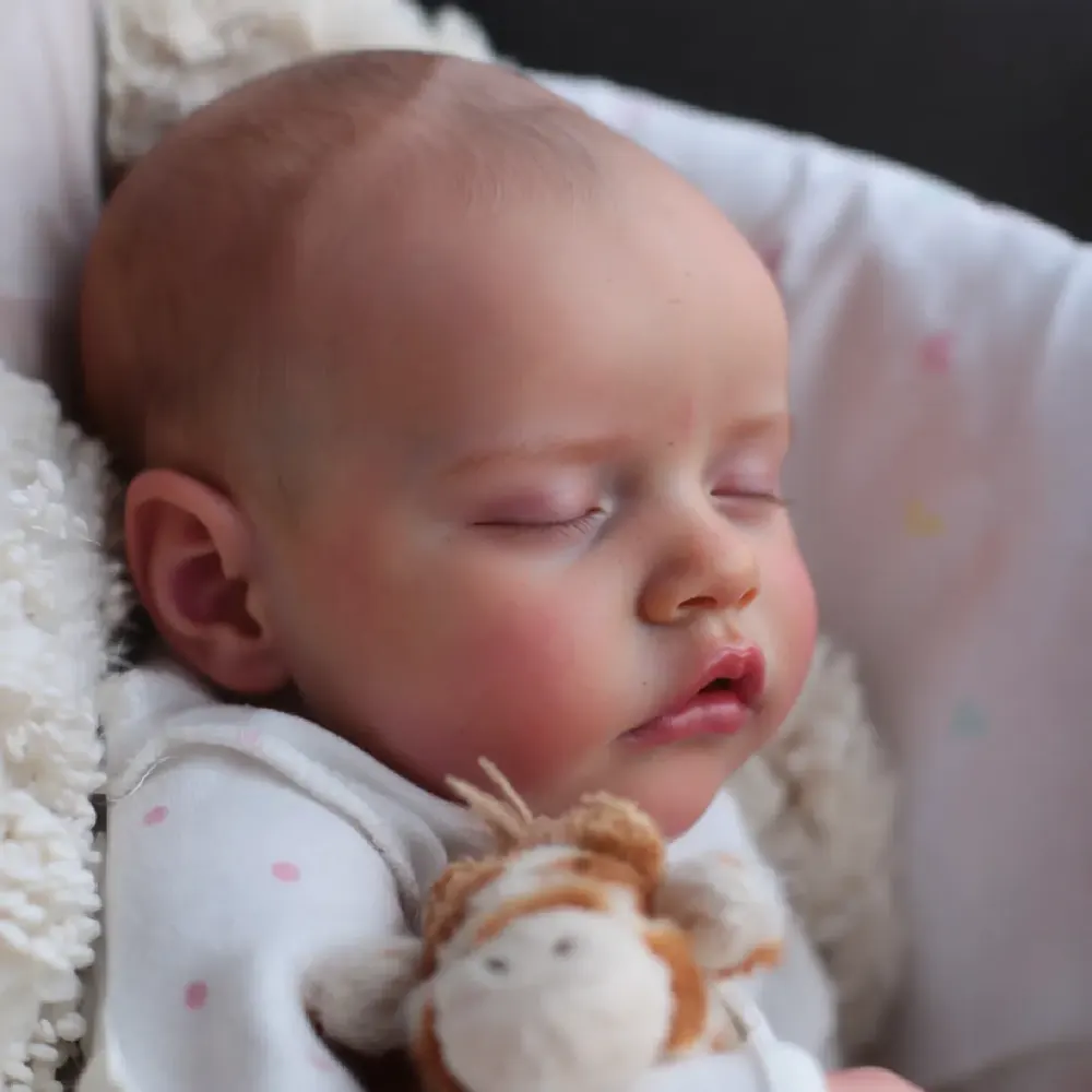 17" Soft Vinyl Closed Eye Reborn Girl with Brown Hair Supported by Heartbeat, photograph 5