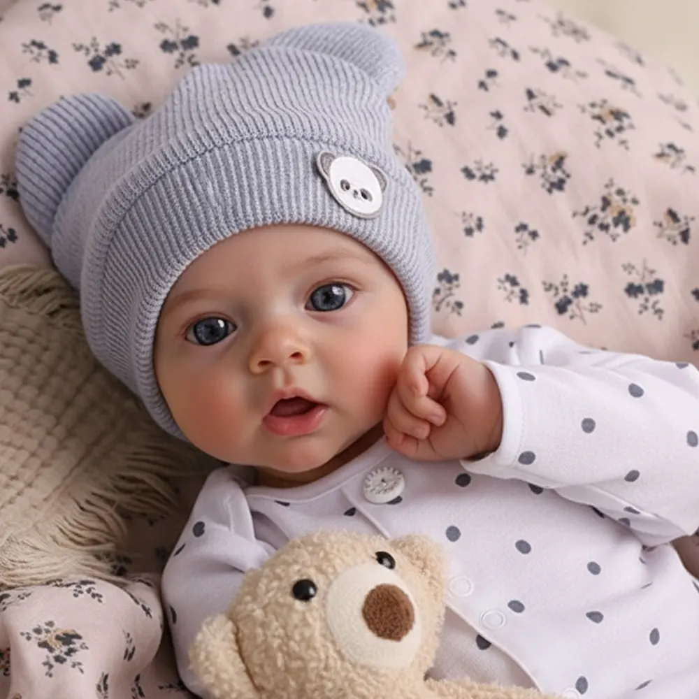 17" Doe-Eyed Reborn Baby Doll with Soft Cloth and Weighted Body, photograph 3